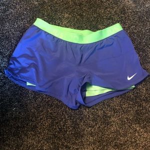 Purple Nike shorts